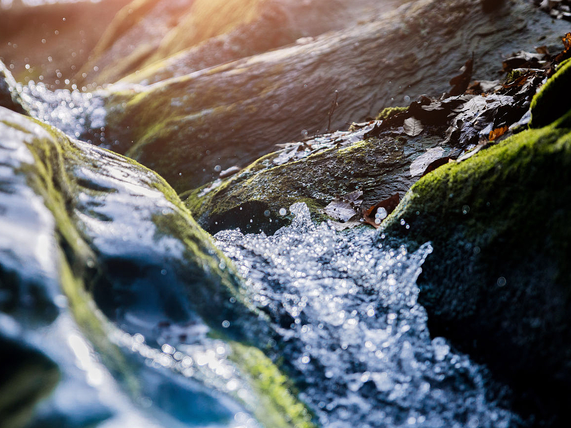 water flowing over rocks