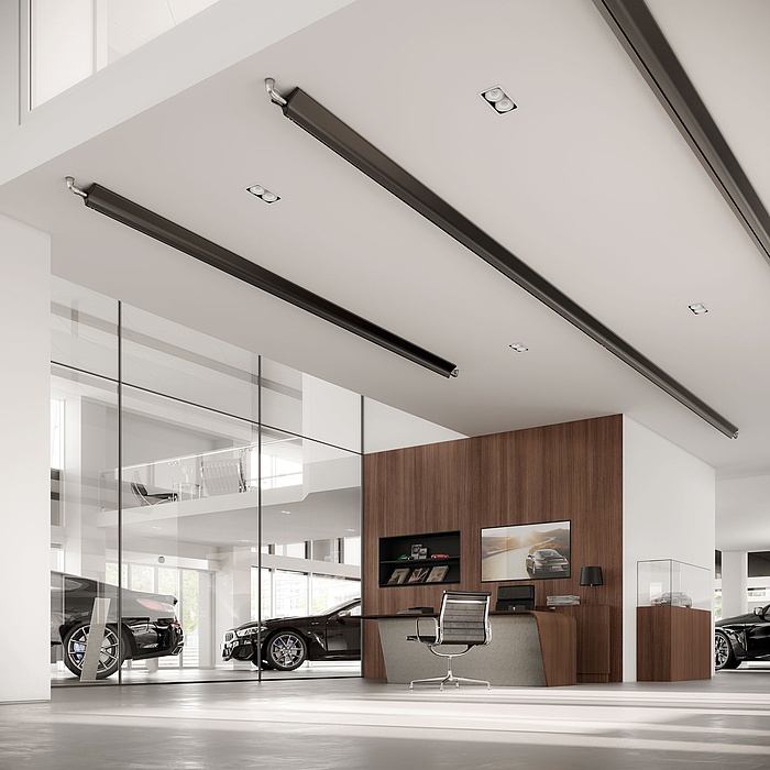 Radiant ceiling profiles ensure a pleasant atmosphere in a car dealership